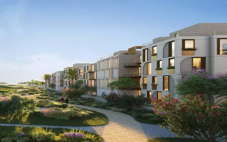 كمبوند الكرنك زايد الجديدة Elkarnak New Zayed وحدتك بمقدم 5% 3 مشهد هادئ يجمع بين الوحدات الحديثة والطبيعة الخضراء داخل كمبوند الكرنك