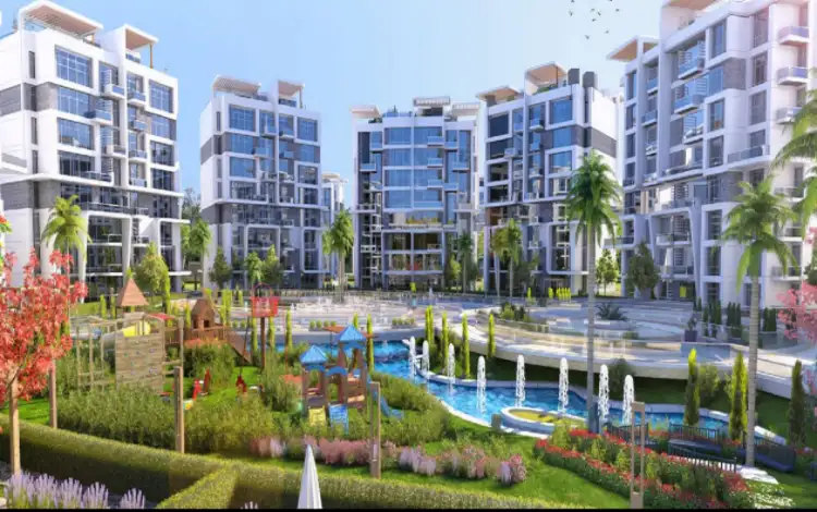 لا كابيتال سويت لاجونز La Capitale Suite Lagoons بمقدم 5% 1 إطلالة على لا كابيتال سويت لاجونز مع المساحات الخضراء والمباني الحديثة.
